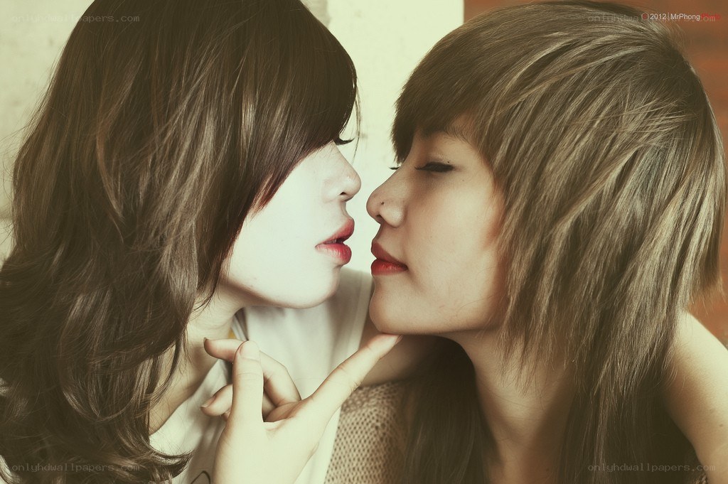 two women in an intimate pose