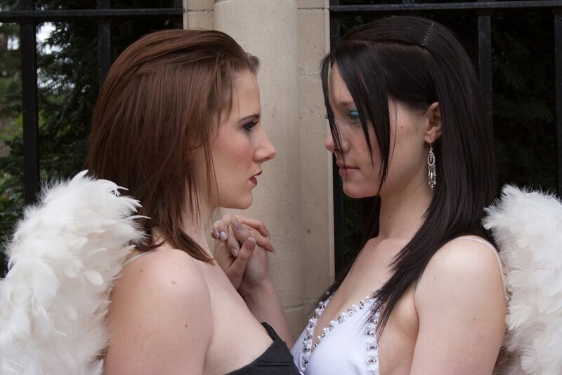 Two women in angel costumes