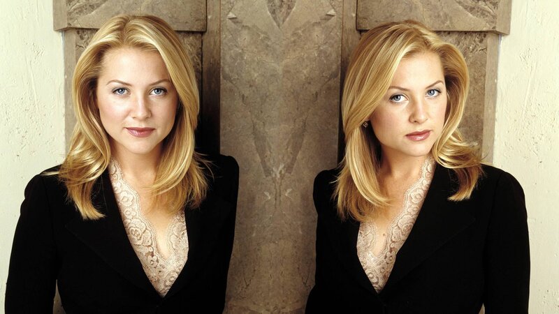 Two Women in Black Blazers