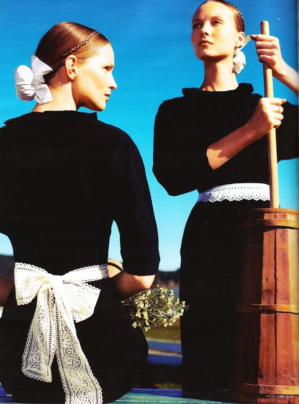 Two women in black dresses