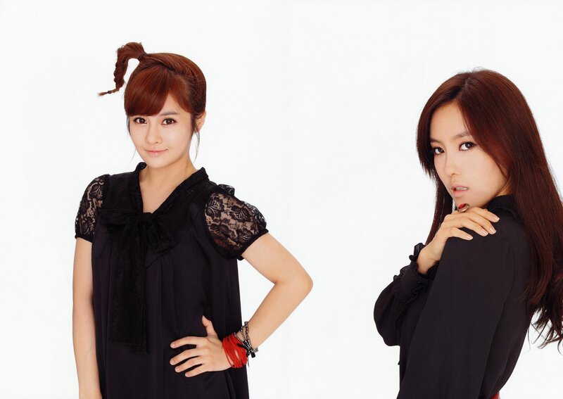 two women in black dresses