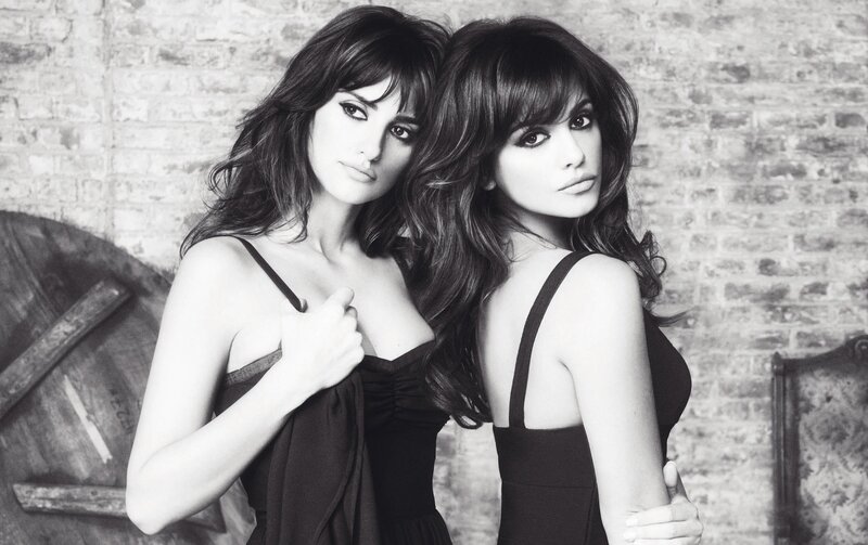 Two women in black dresses