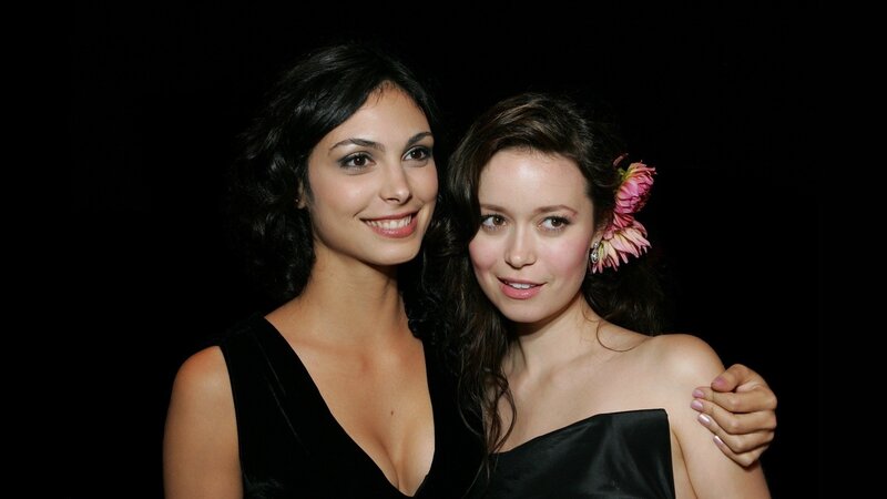 Two Women in Black Dresses — Formal, Photograph, Flower