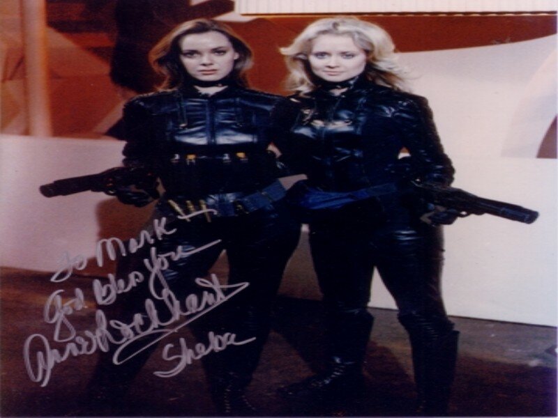 Two Women in Black Suits — Dramatic, Photograph