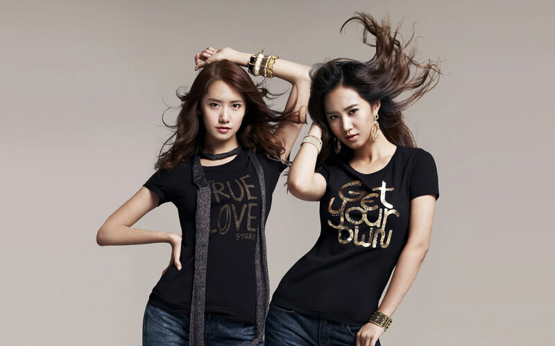 two women in black t-shirts