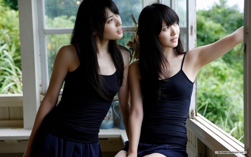 Two Women in Black Tops — Calm