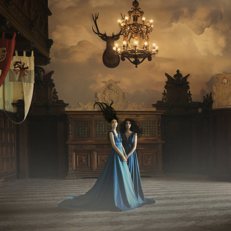 Two Women in Blue Gowns