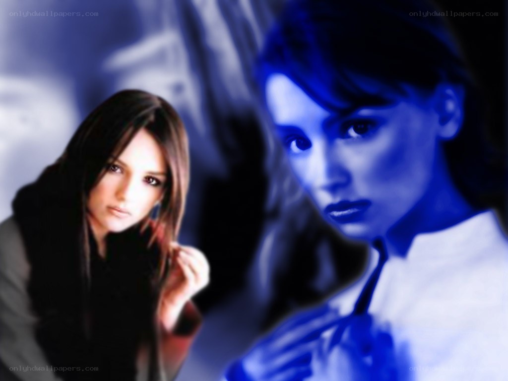 two women in blue lighting