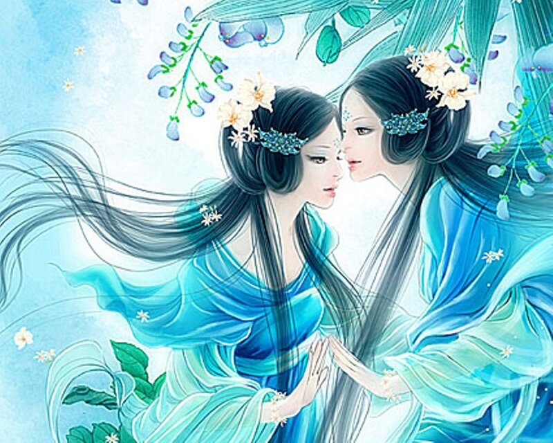 two women in blue robes