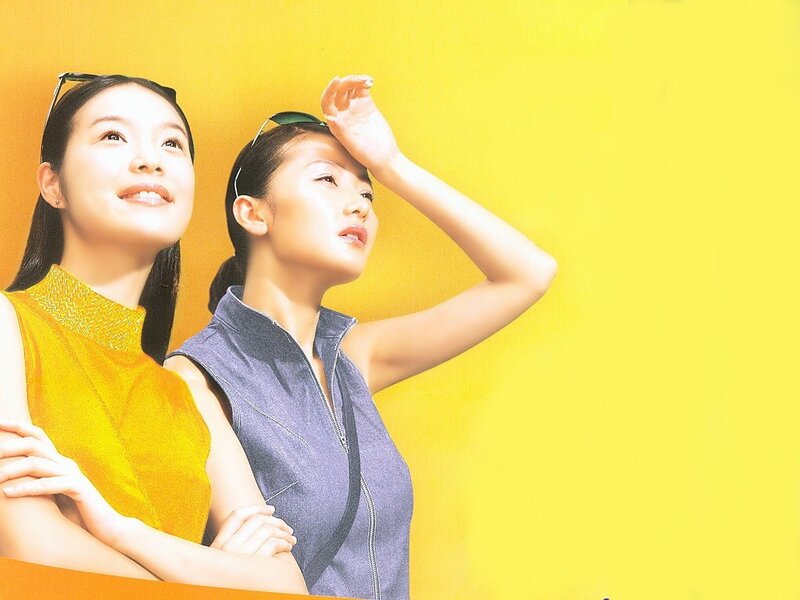 two women in bright clothing