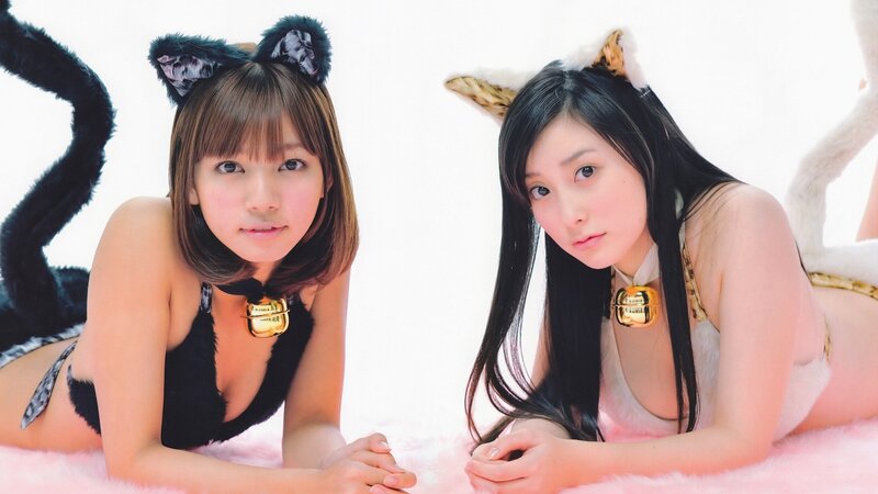 two women in cat costumes