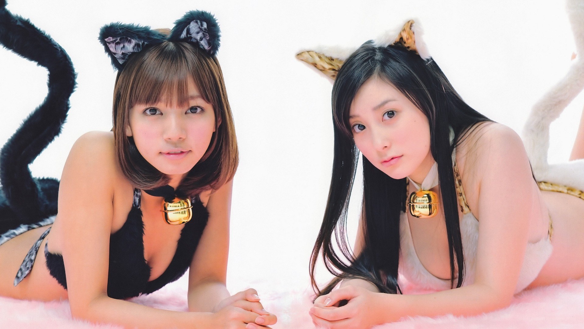 two women in cat costumes
