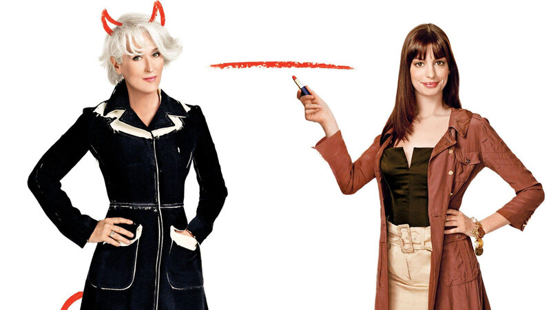 Two Women in Coats — White