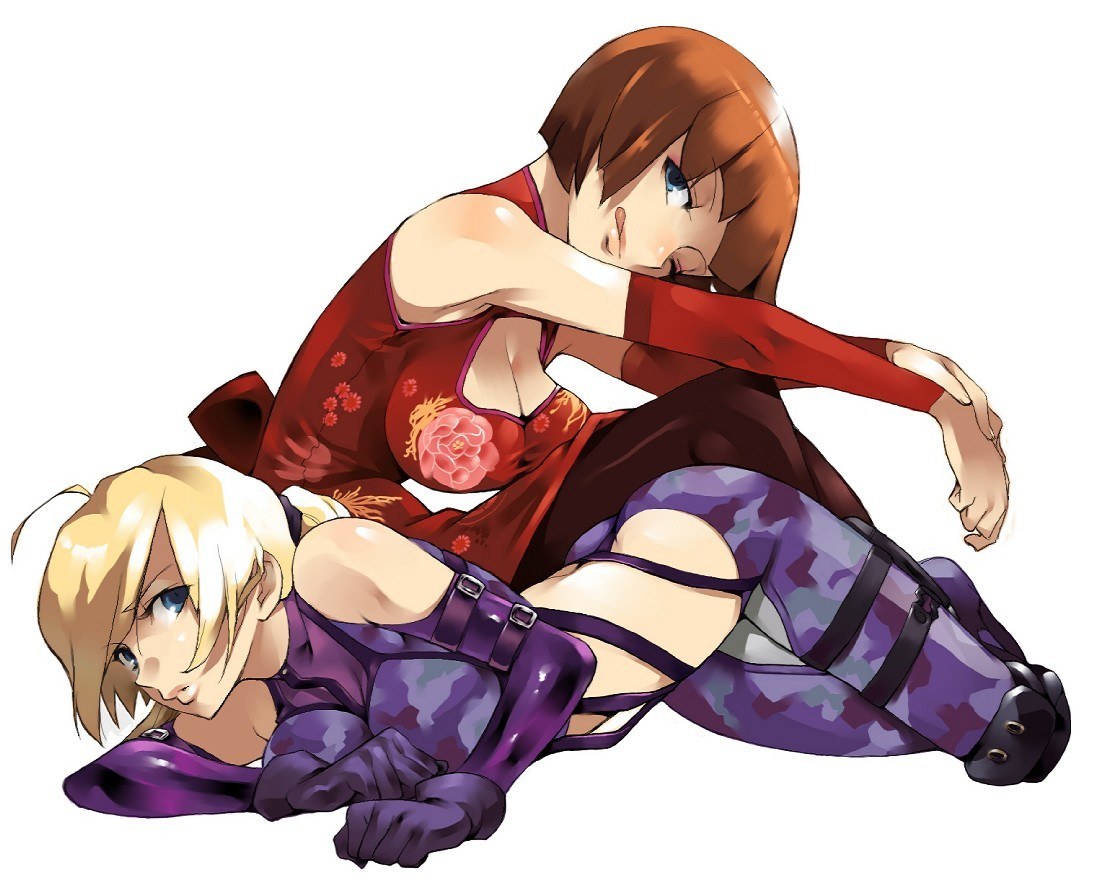 Two women in combat pose