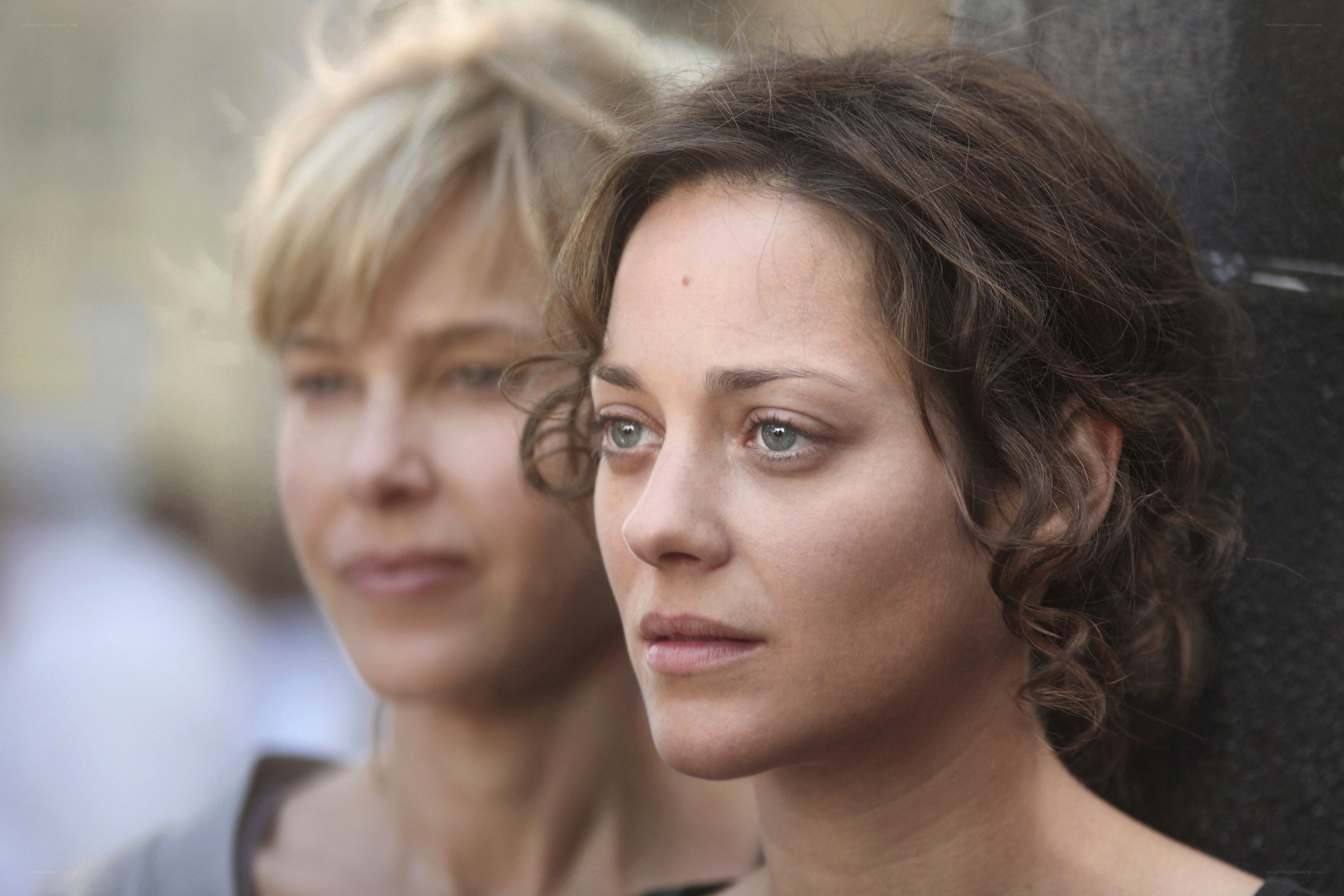 two women in contemplative pose