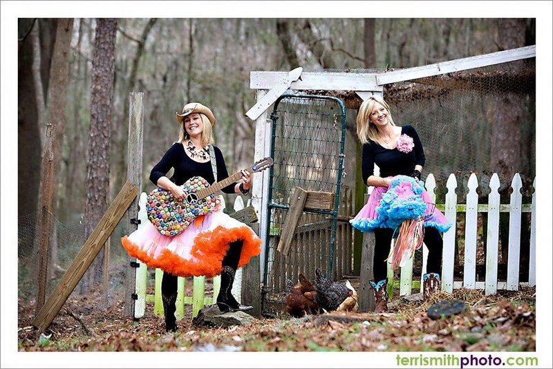 Two Women in Costumes — Black, Playful
