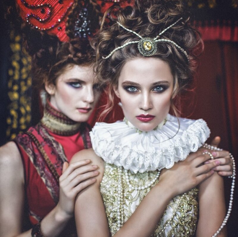 Two Women in Costumes — Red, Dramatic, Photograph, Makeup