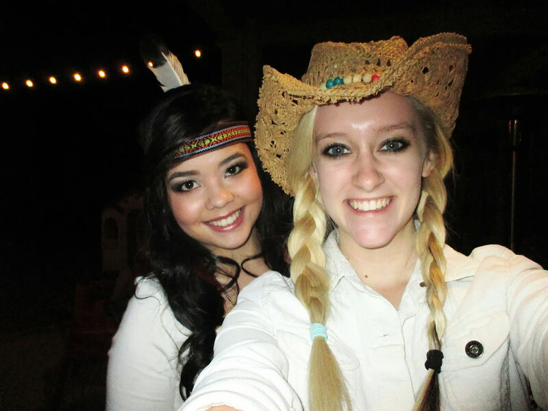 Two Women in Costumes — White, Happy