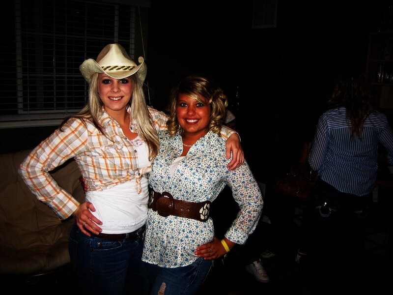 Two Women in Cowboy Hats — White, Happy, Night