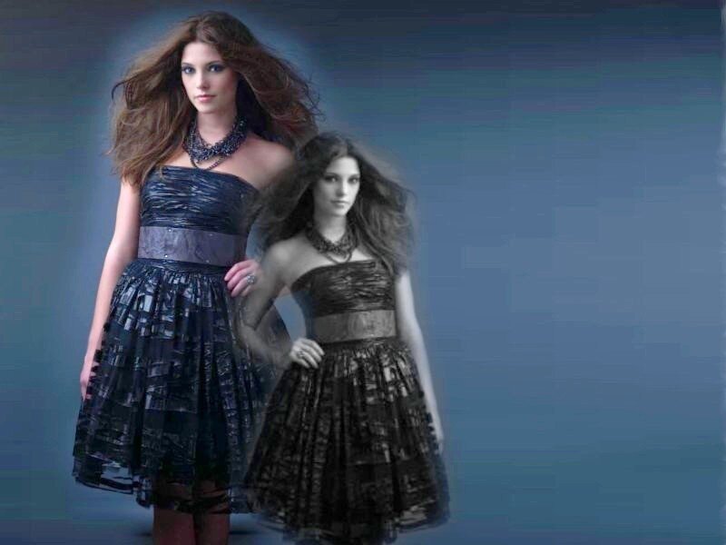 Two women in dark dresses