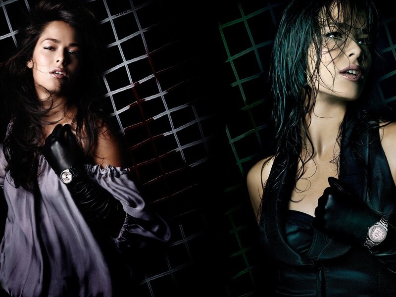 Two women in dark fashion