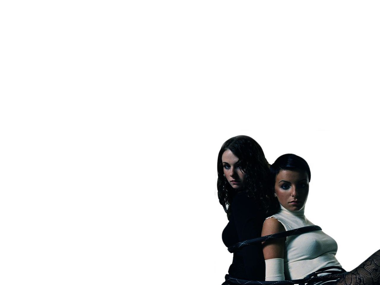 two women in dark setting