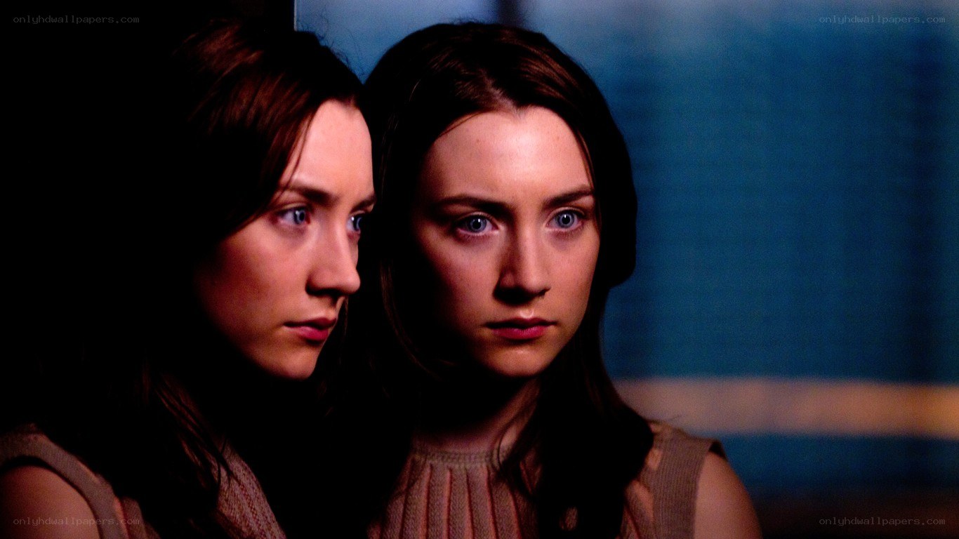 two women in dim light