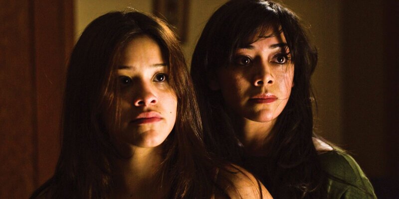Two Women in Dim Light — Brown
