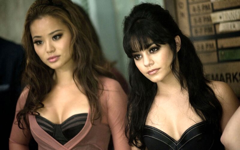 Two Women in Dresses — Black, Serious