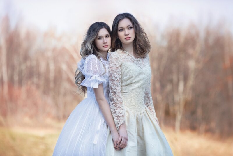 Two Women in Dresses — White, Serene