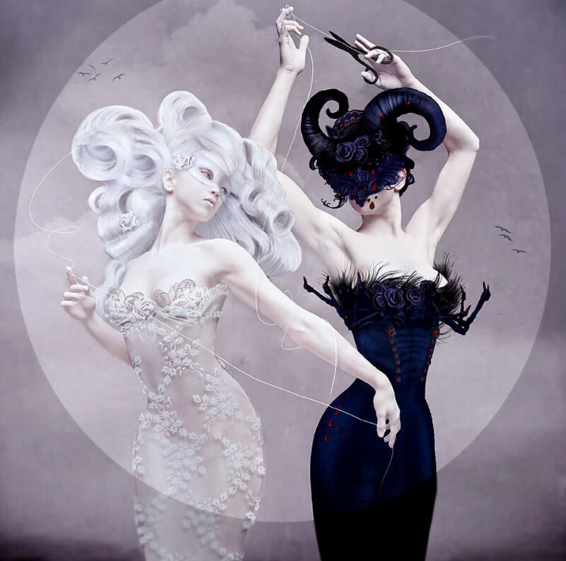 Two women in elaborate costumes