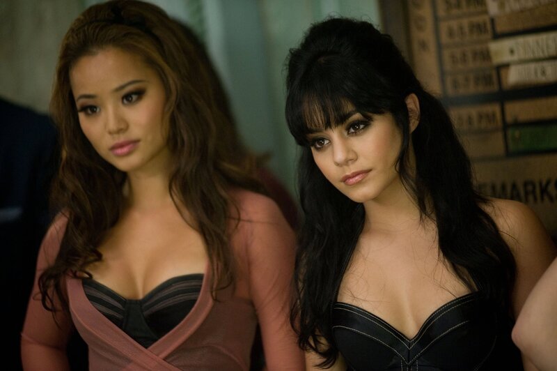 Two women in elegant dresses