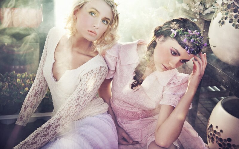 Two women in floral attire