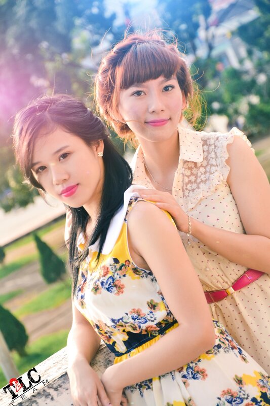 Two women in floral dresses