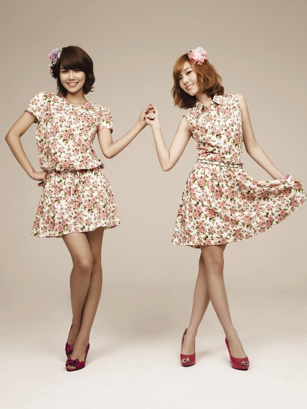 two women in floral dresses