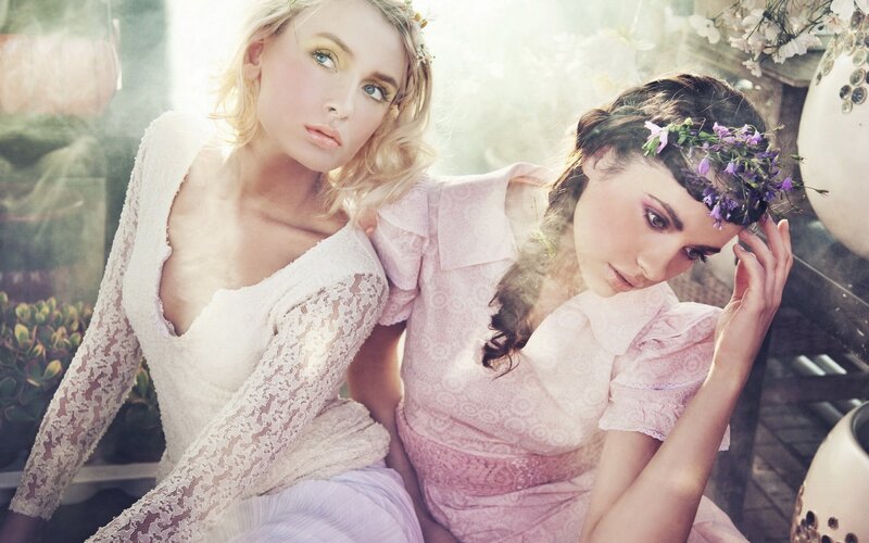 Two women in floral dresses