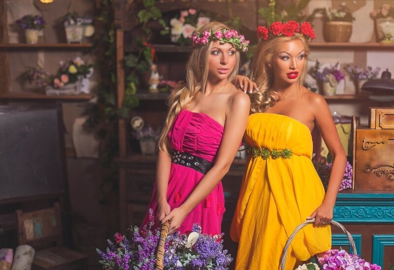 Two Women in Floral Dresses — Pink