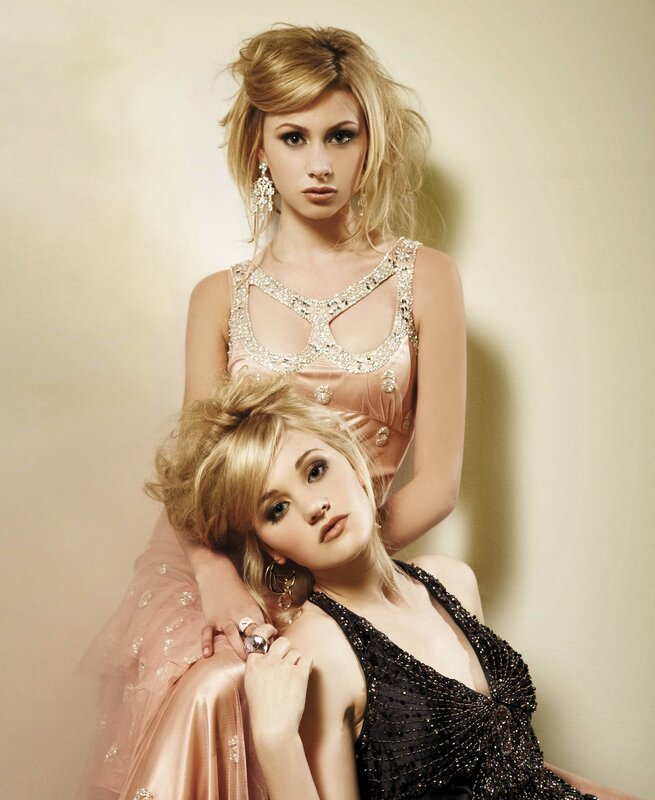 Two women in glamorous dresses