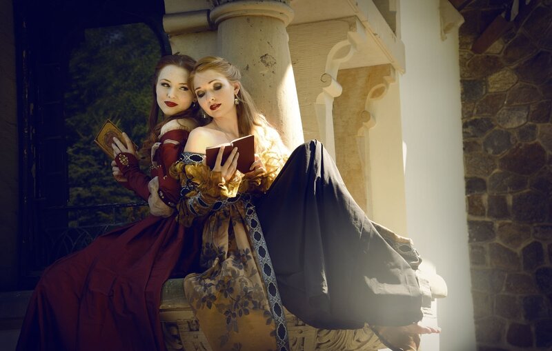 Two Women in Historical Dresses — Red