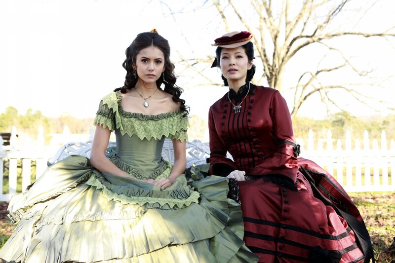 Two women in historical dresses