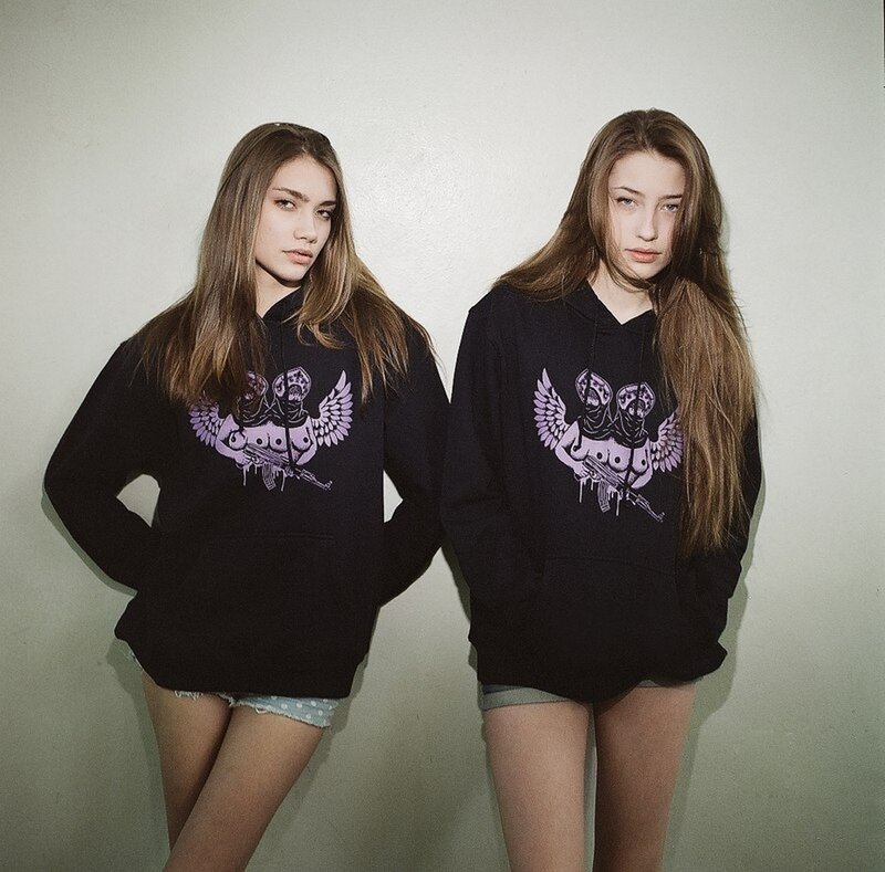 Two women in hooded sweatshirts