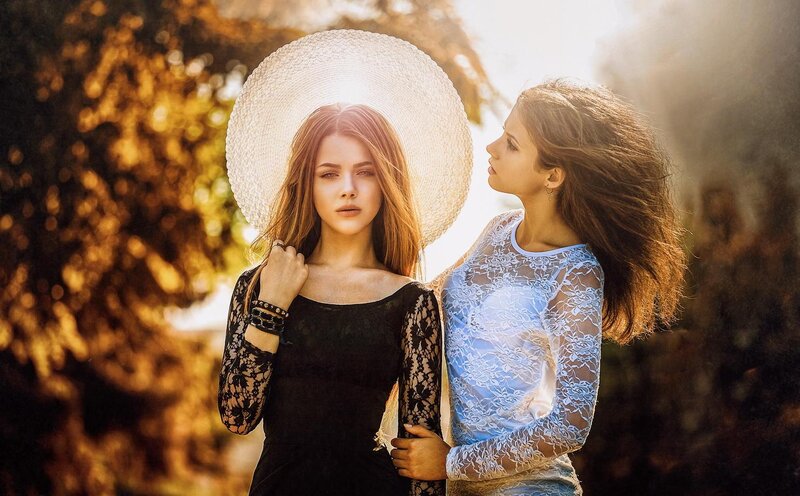 Two Women in Lace Dresses — Black