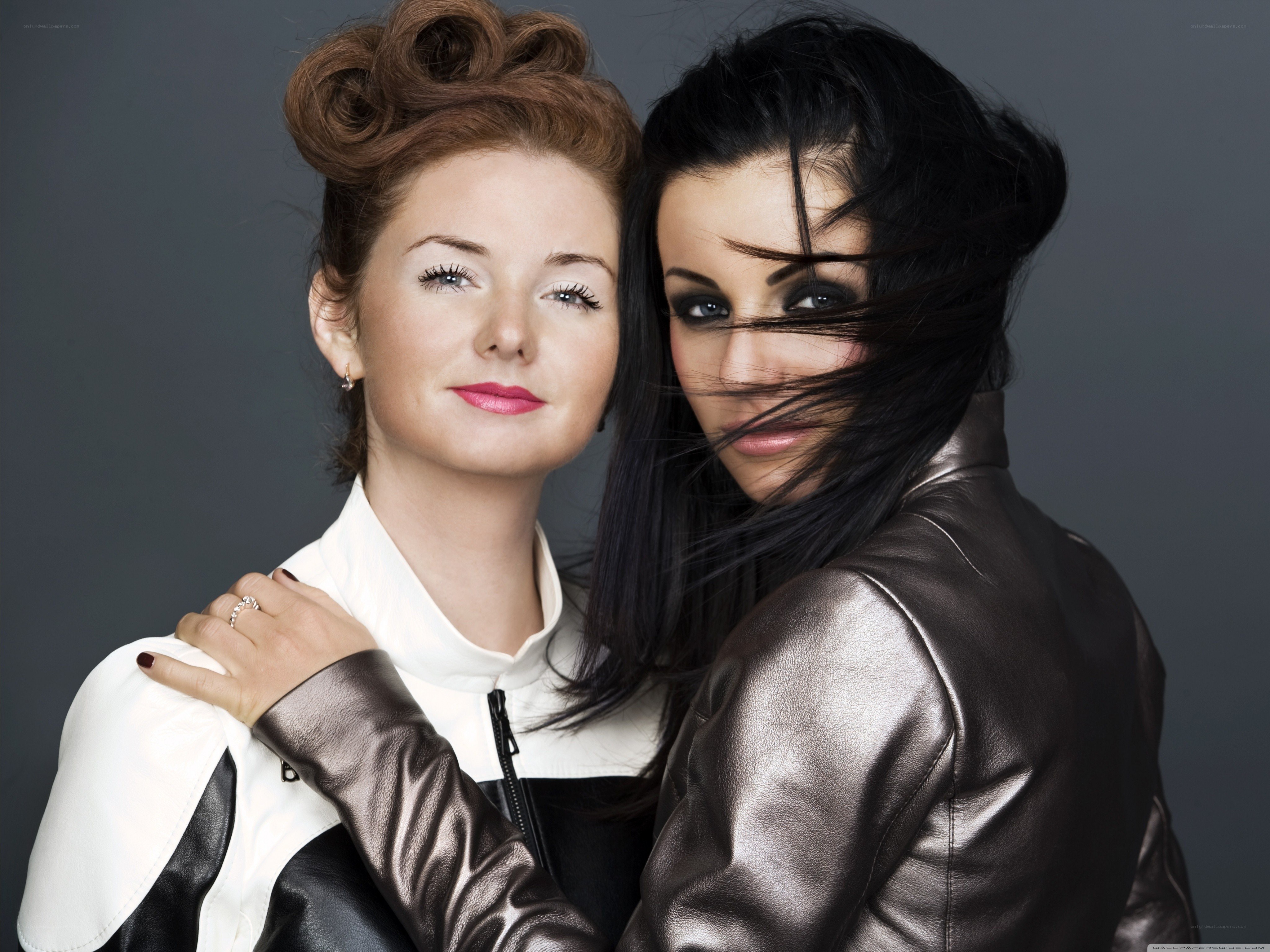 Two women in leather jackets