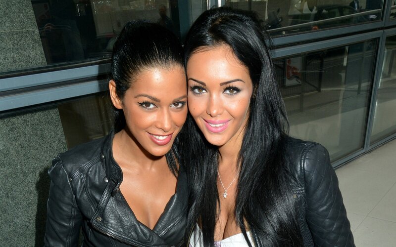 two women in leather jackets