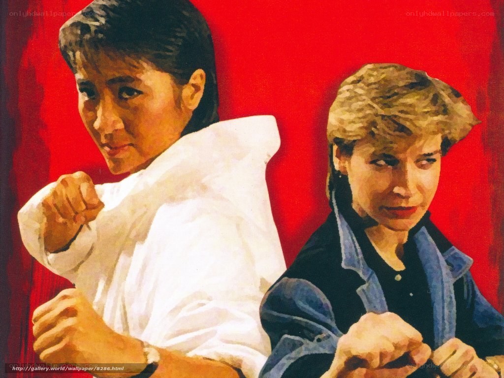 Two women in martial arts pose