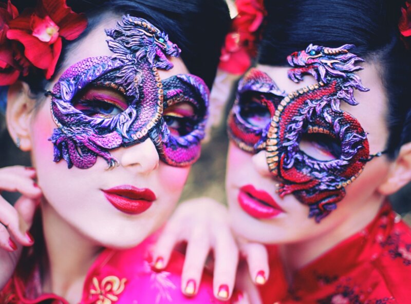 Two Women in Masks — Red
