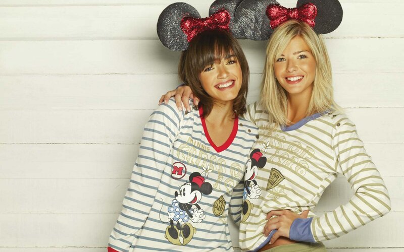 Two women in Minnie Mouse pajamas