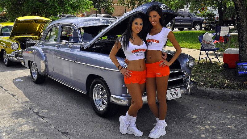 Two Women in Orange Shorts