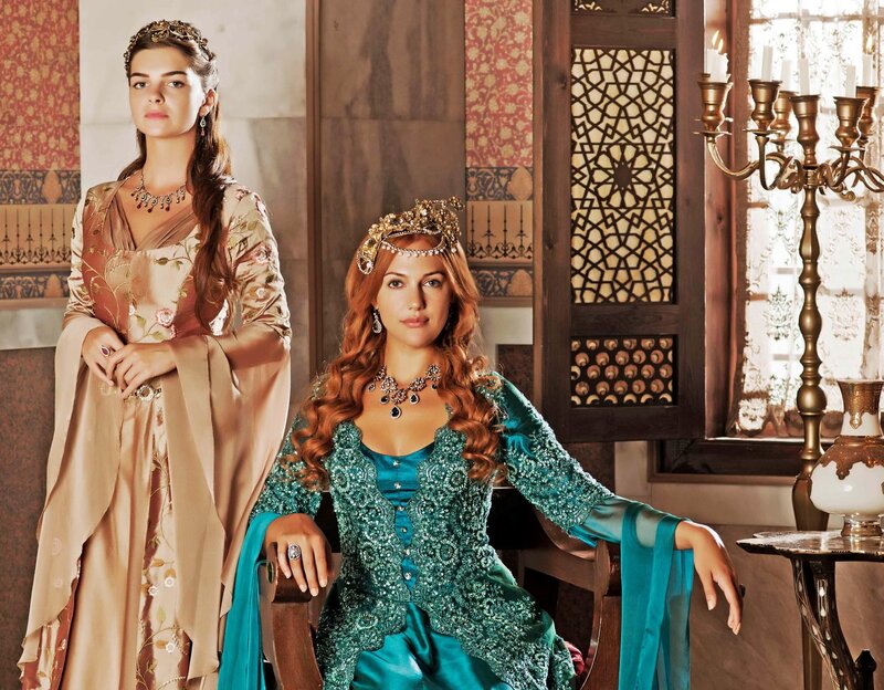 Two women in ornate costumes