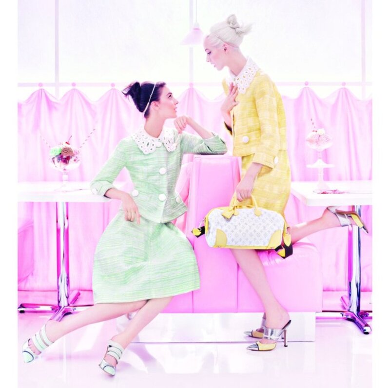 Two Women in Pastel Suits